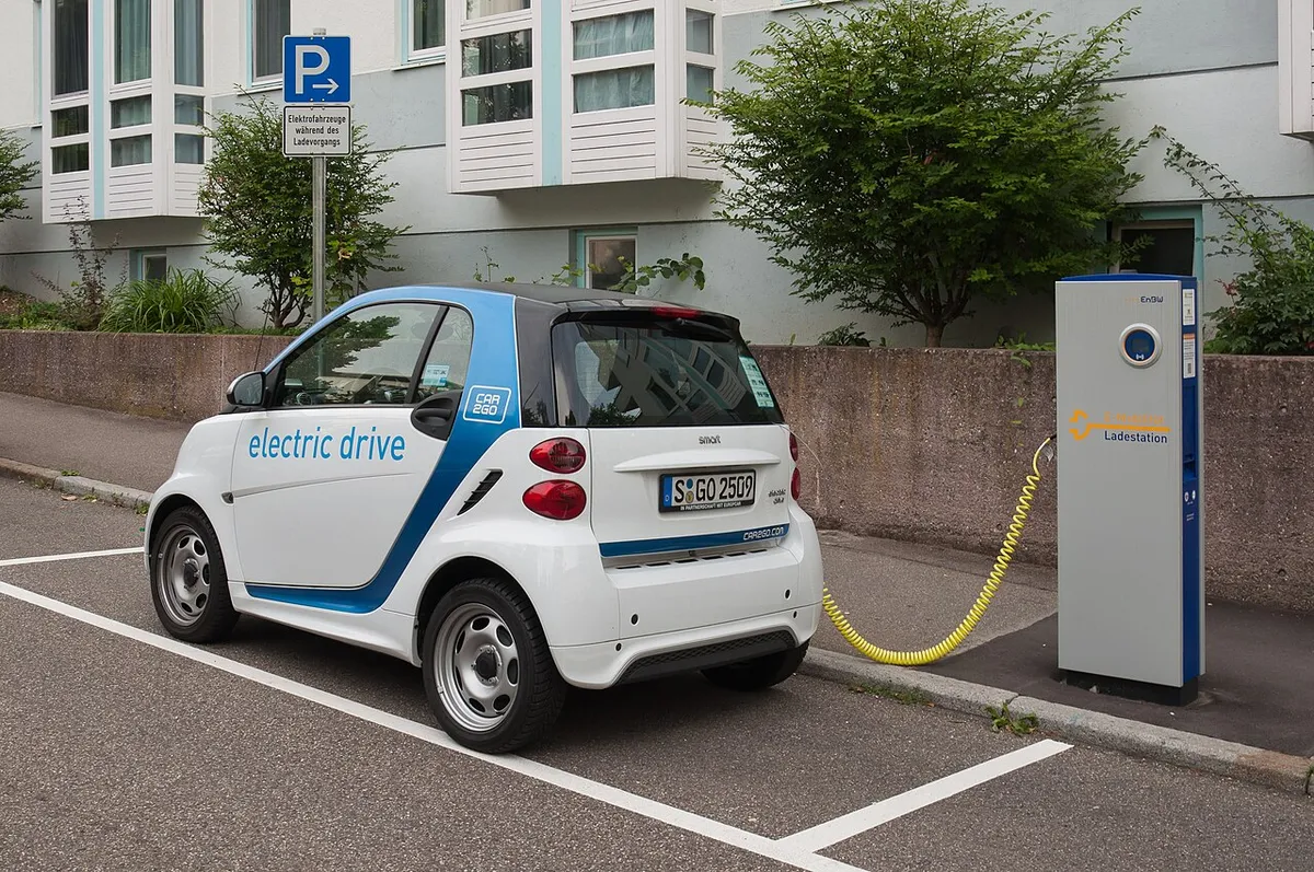 EnBW electric car charging station in Stuttgart with a third-generation Smart electric car of carsharing company Car2Go