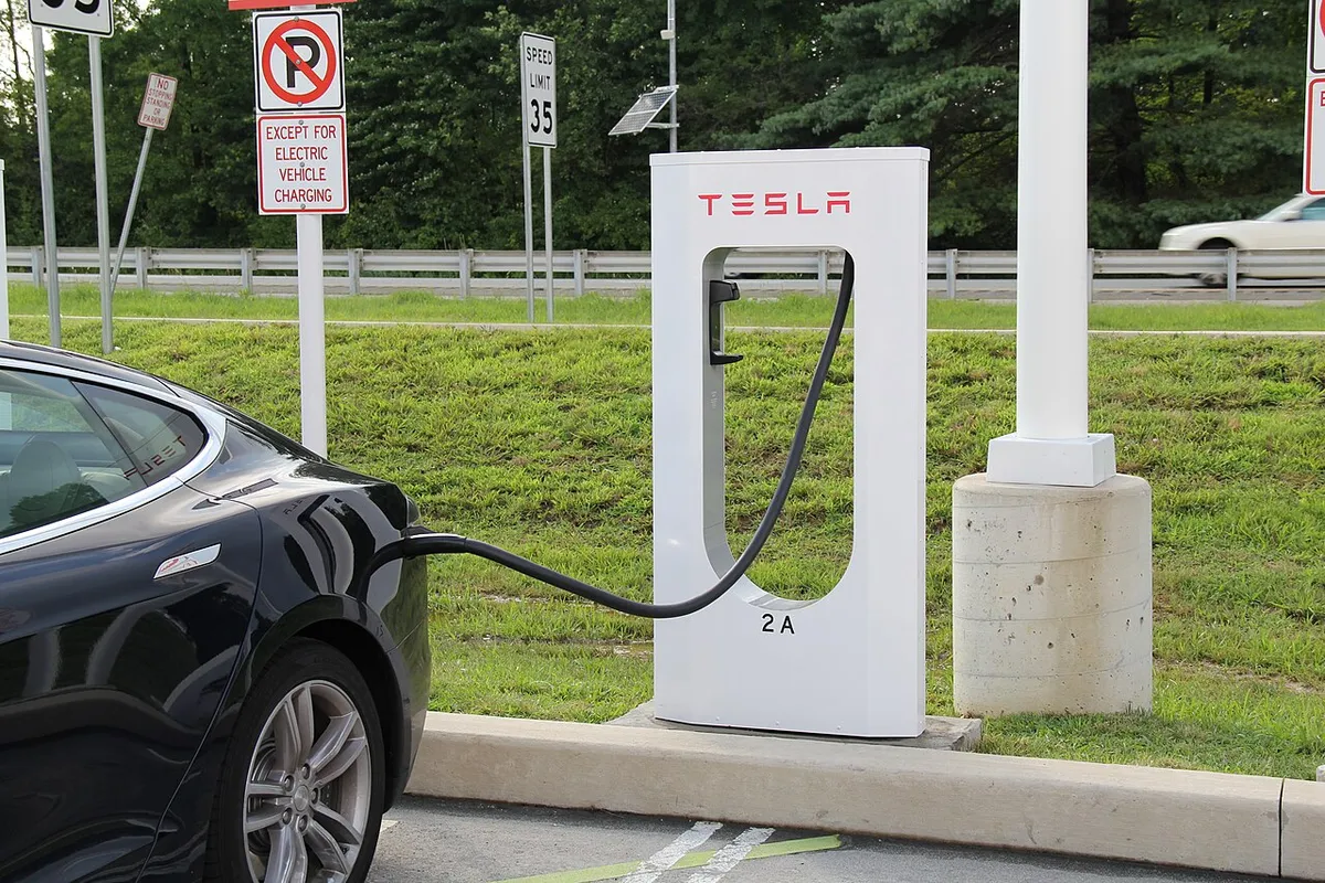 Tesla Model S charging at a Tesla Supercharger station at the Delaware Welcome Center